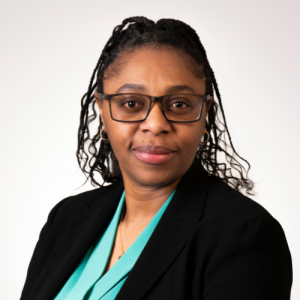 Adekemi Suleiman smiling in headshot