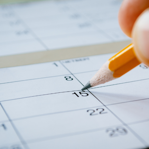 a pencil pointing to calendar